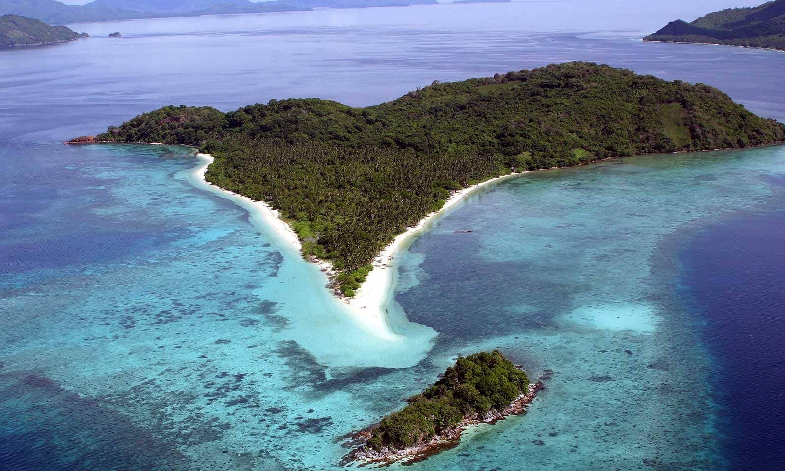 maosonon island arial shot of the island showing its long ejecting beach