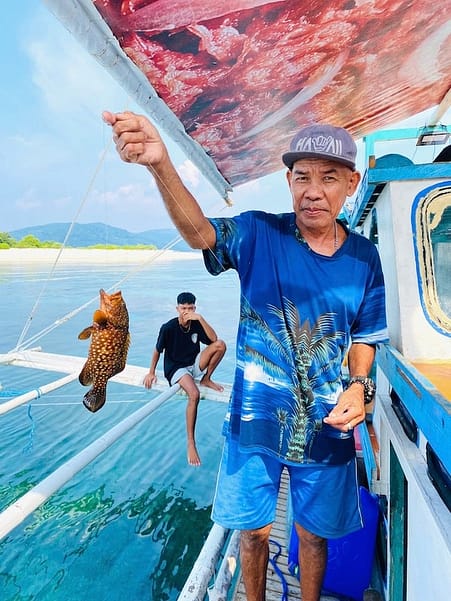 kate island hopping boat tour review catching fish