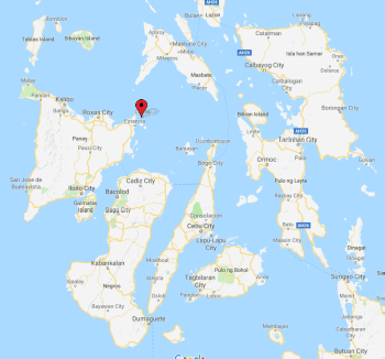 Map showing parts of the Philippines with a red marker indicating a boat tour location near Cebu and Bohol Islands.